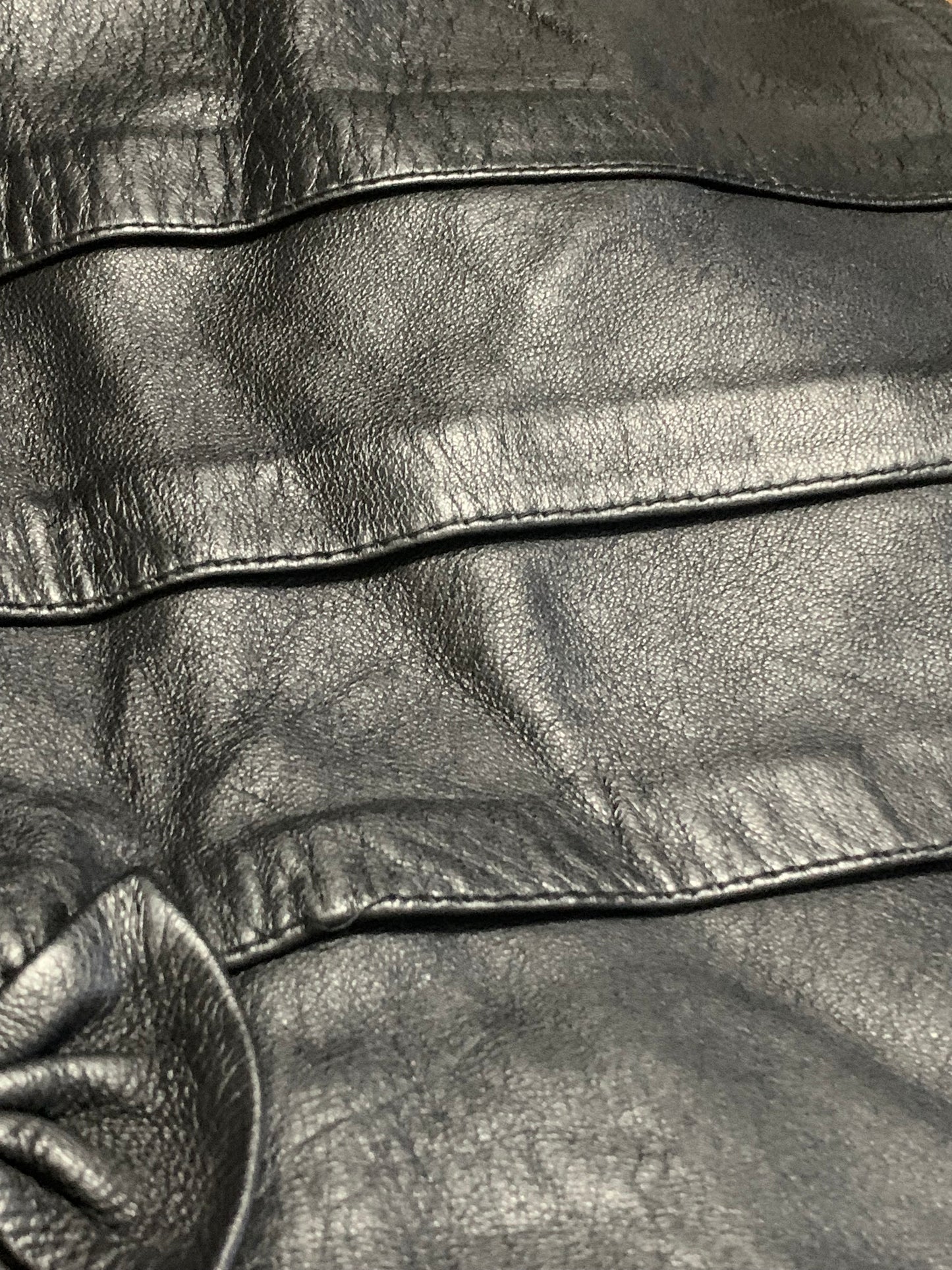 Jupe en cuir noir avec empiècements et nœud vintage