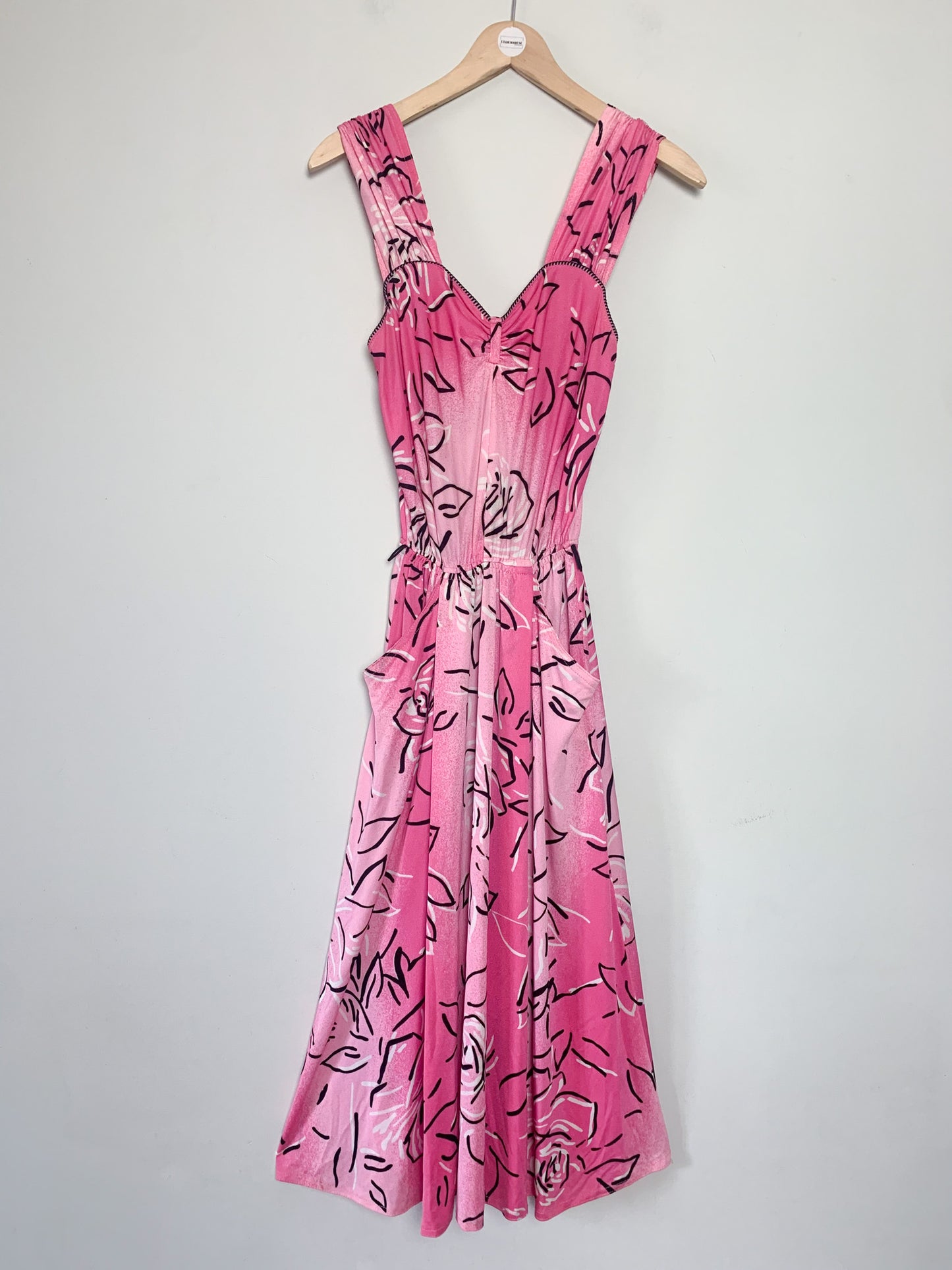 Robe vintage années 80 rose à imprimé floral stylisé #robes #vintage