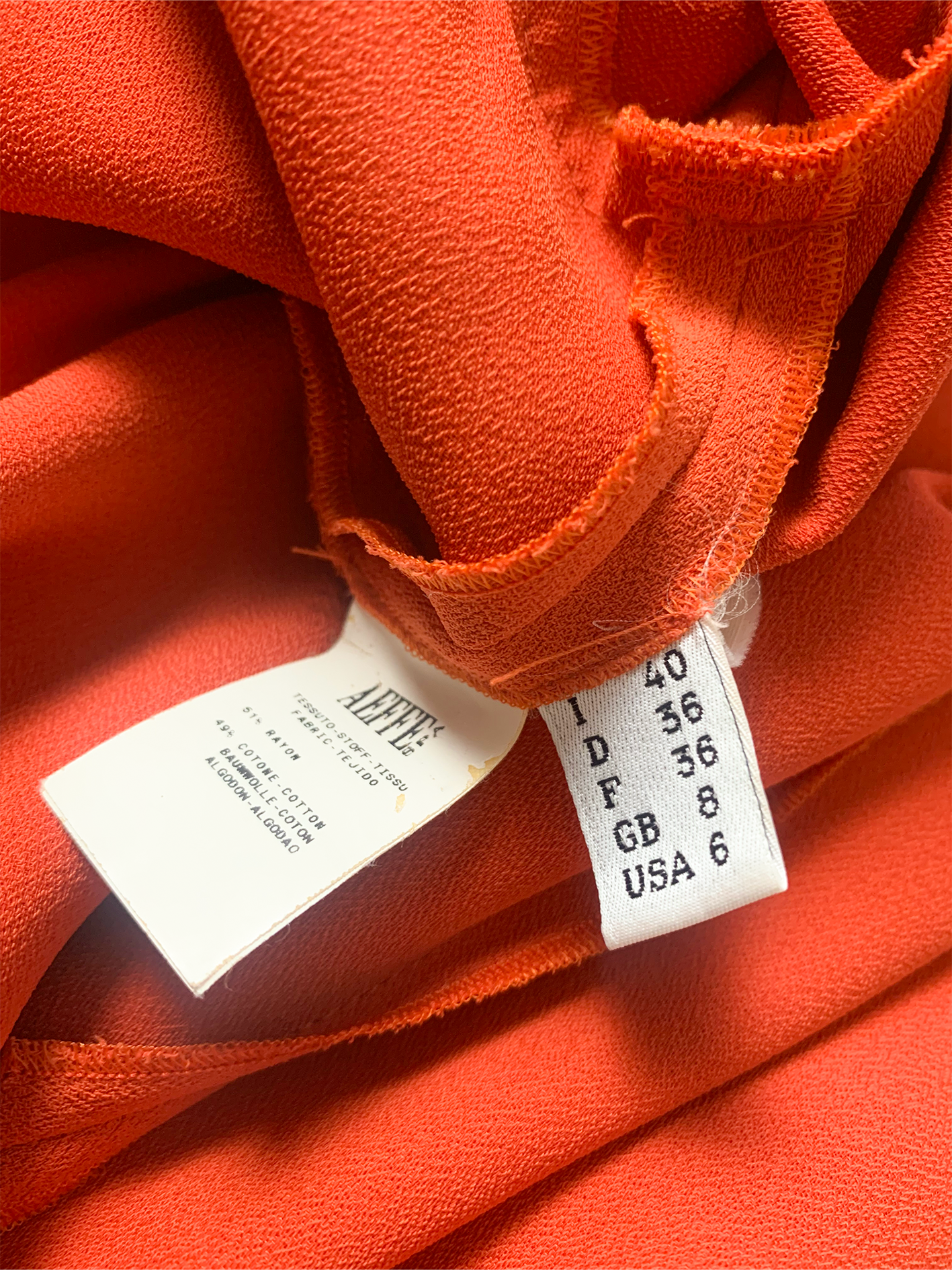 Robe en crêpe orange vintage Cacharel