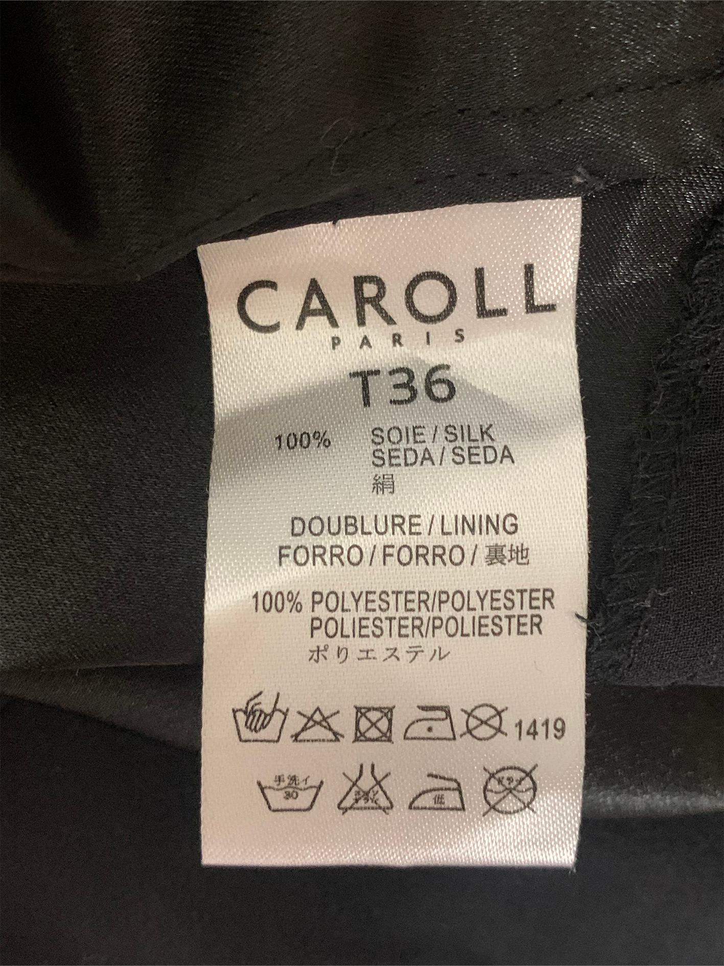 Robe noire en soie véritable à volants Caroll