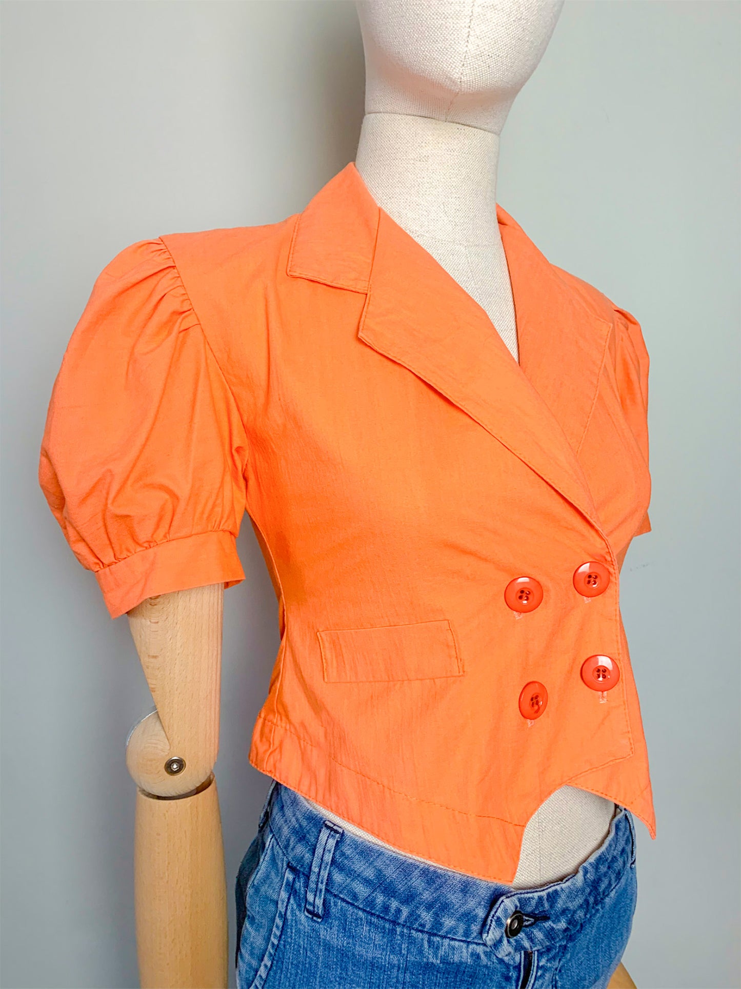 Veste courte orange cintrée vintage