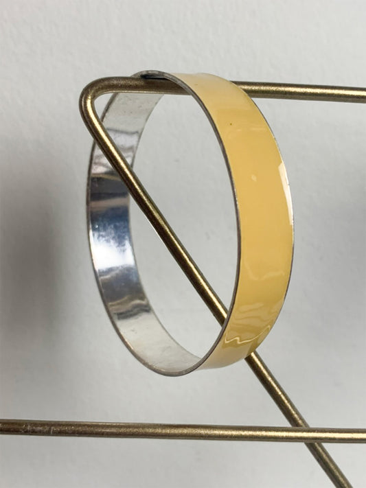 Bracelet jonc jaune en métal vintage
