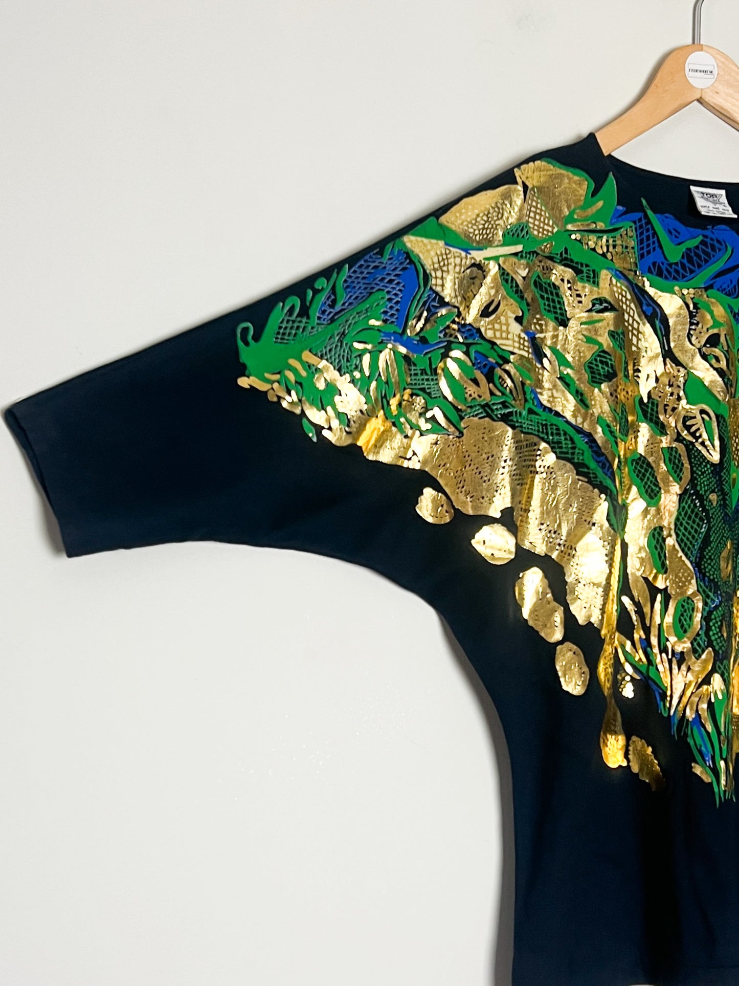 T-Shirt Vintage Années 80 Noir Imprimés Doré, Vert et bleu - Épaulettes & Manches Chauve-Souris 100% coton - T 38/40