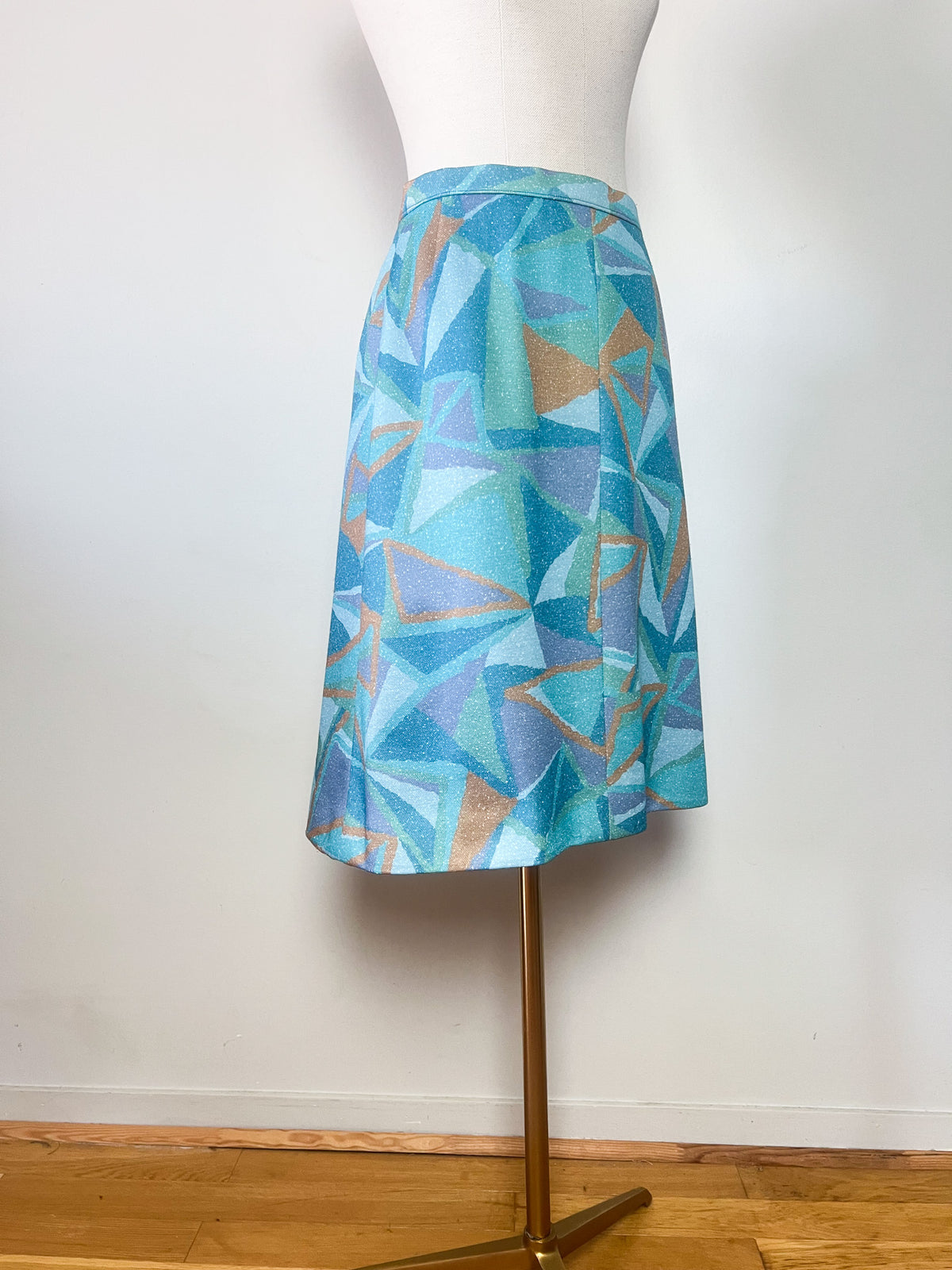 Jupe trapeze vintage 70s à motif géométrique — Vert d'eau, bleu & ocre (Taille 36/38