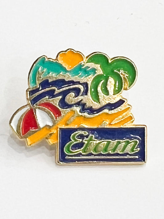 Pin's publicitaire vintage années 80 90 Etam motif plage et cocotier — Métal émaillé