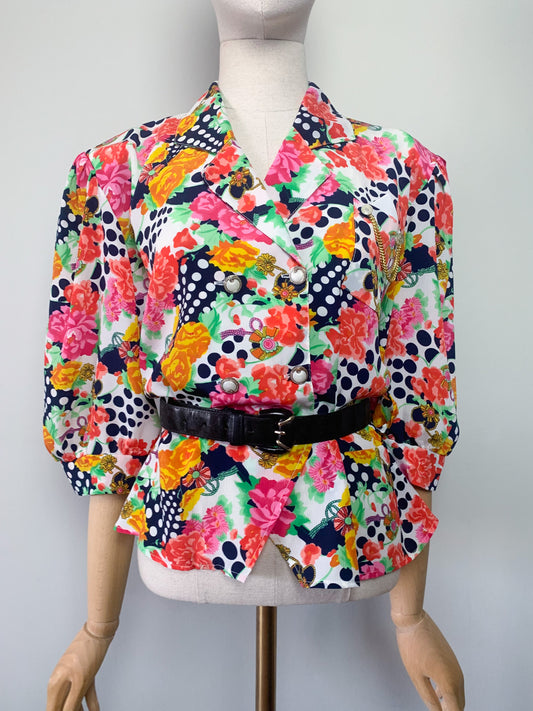 Top blouse femme colorée à basque manches courtes imprimés fleurs et pois vintage